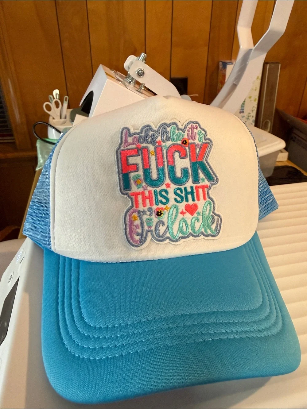 Blue and White Trucker Hat with Colorful Patch